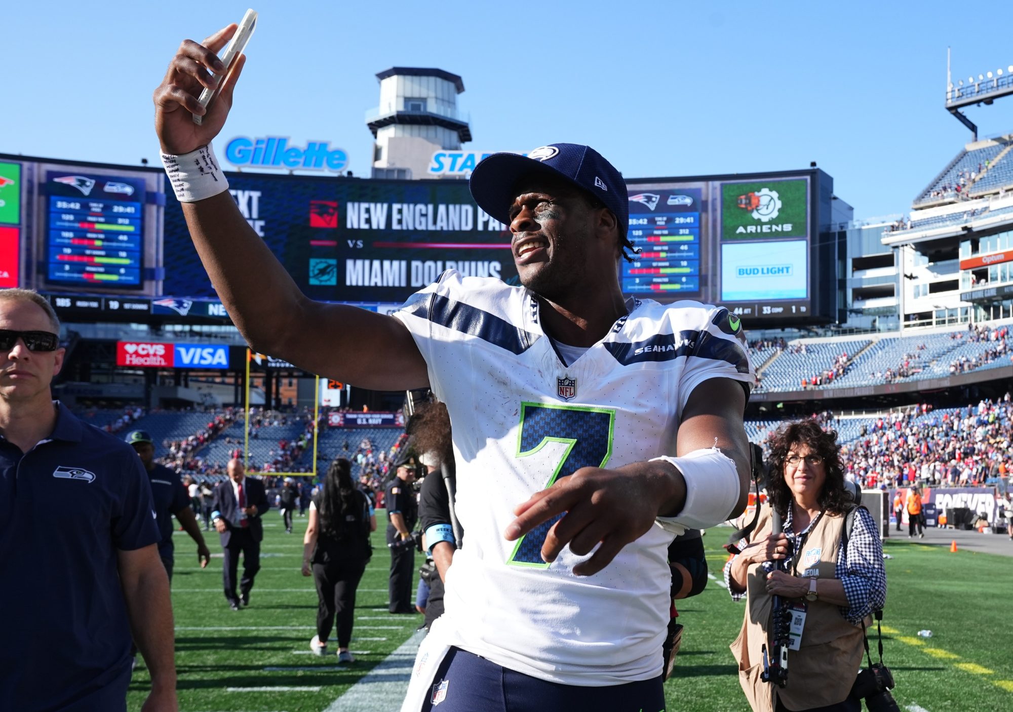 Sep 15, 2024; Foxborough, Massachusetts, USA; Seattle Seahawks quarterback Geno Smith (7) on a video call after defeating the New England Patriots at Gillette Stadium.