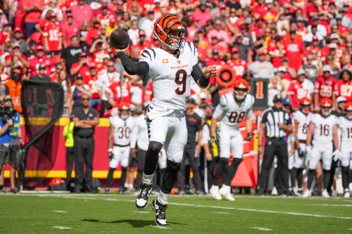 Sep 15, 2024; Kansas City, Missouri, USA; Cincinnati Bengals quarterback Joe Burrow (9) throws a pass against the Kansas City Chiefs during the first half at GEHA Field at Arrowhead Stadium.