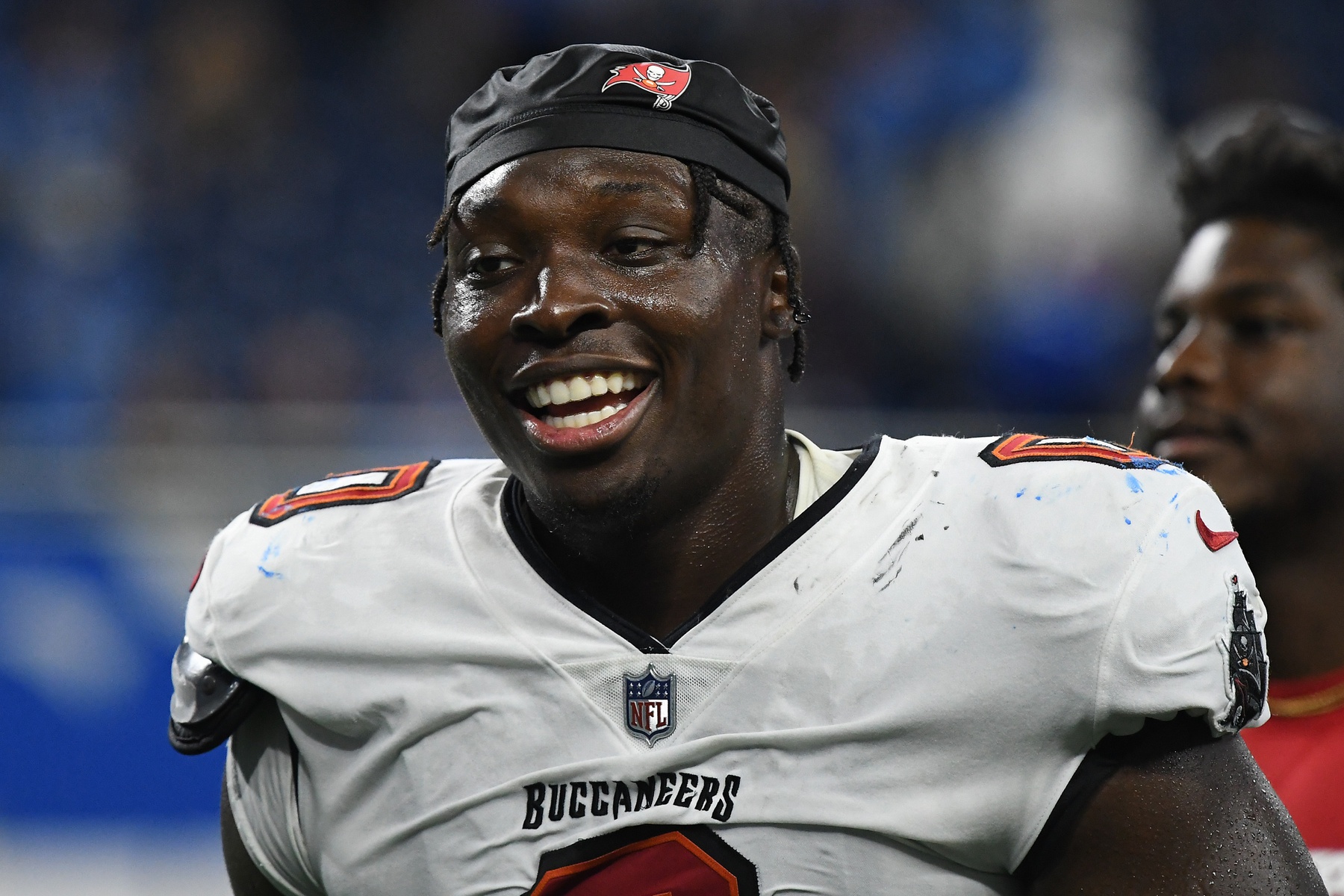 Sep 15, 2024; Detroit, Michigan, USA; Tampa Bay Buccaneers linebacker Yaya Diaby (0) smiles after their game against the Detroit Lions at Ford Field.