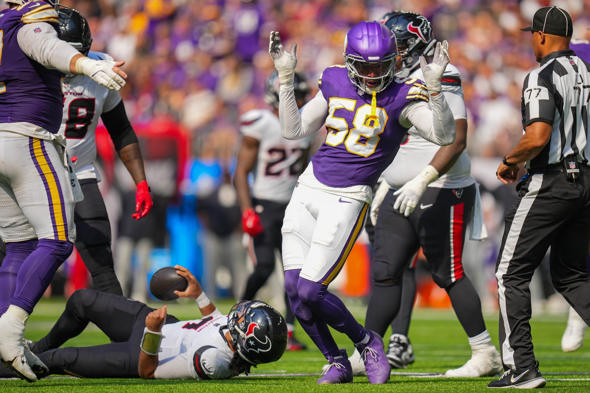 Sep 22, 2024; Minneapolis, Minnesota, USA; Minnesota Vikings linebacker Jonathan Greenard (58) celebrates his sack against the Houston Texans quarterback C.J. Stroud (7) in the third quarter at U.S. Bank Stadium.