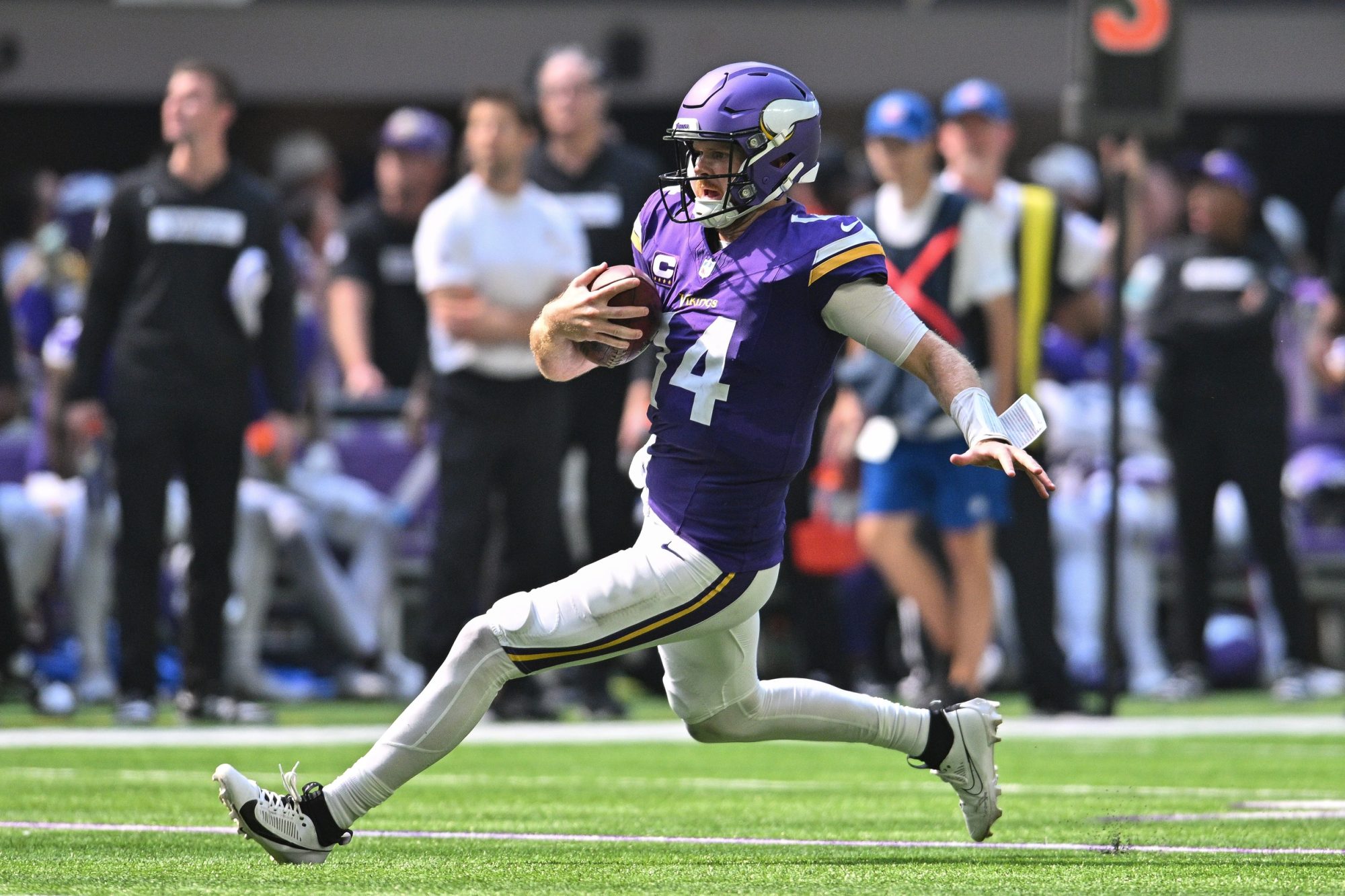 Sep 15, 2024; Minneapolis, Minnesota, USA; Minnesota Vikings quarterback Sam Darnold (14) in action against the San Francisco 49ers during the game at U.S. Bank Stadium.