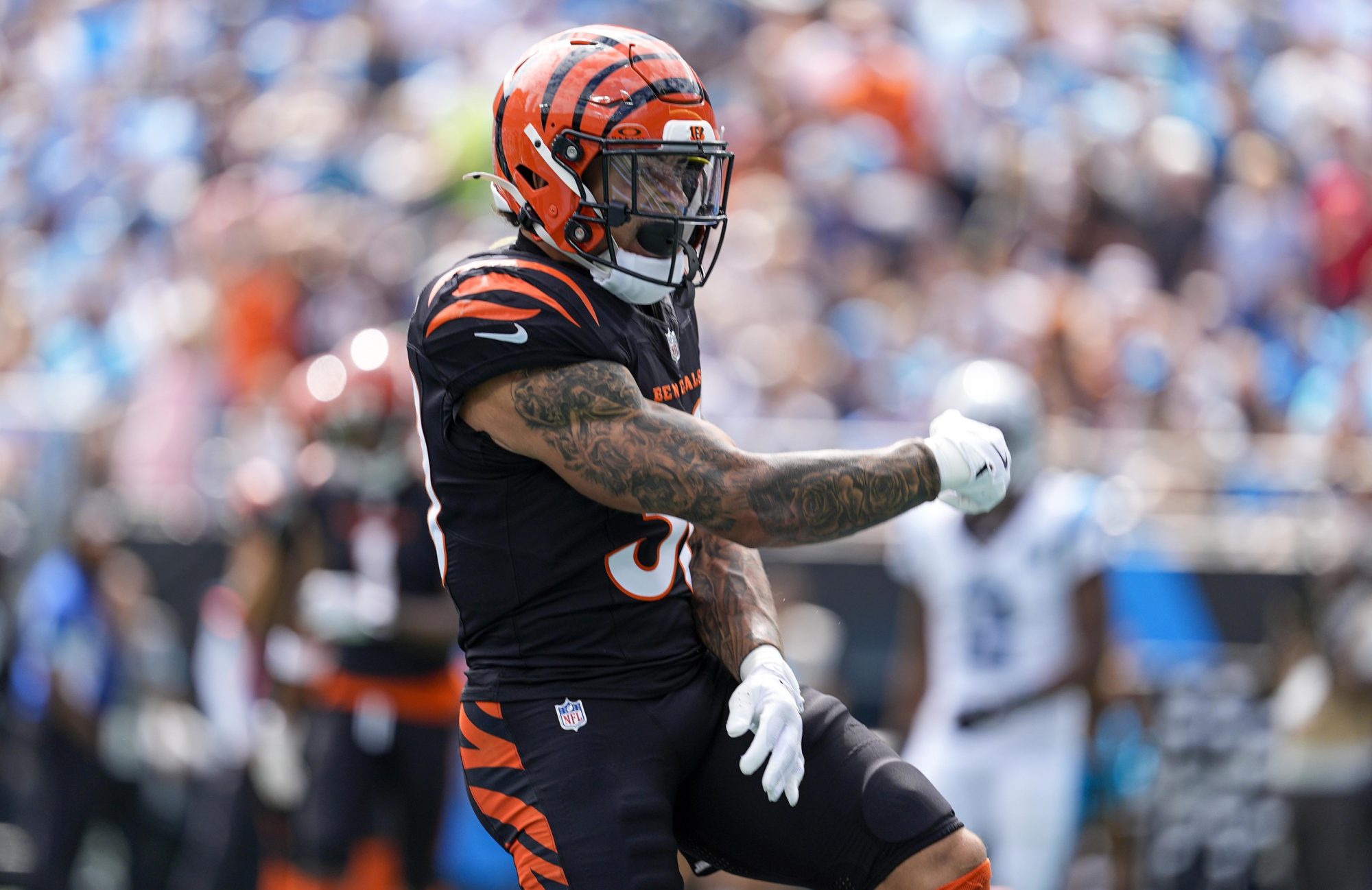 Sep 29, 2024; Charlotte, North Carolina, USA; Cincinnati Bengals running back Chase Brown (30) reacts to his touchdown run against the Carolina Panthers during first quarter at Bank of America Stadium.