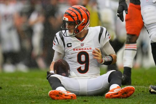 Cincinnati Bengals quarterback Joe Burrow (9) recovers on the ground after being sacked by Cleveland Browns defensive end Myles Garrett (95) in the fourth quarter of the NFL Week 1 game between the Cleveland Browns and the Cincinnati Bengals at FirstEnergy Stadium in downtown Cleveland on Sunday, Sept. 10, 2023.