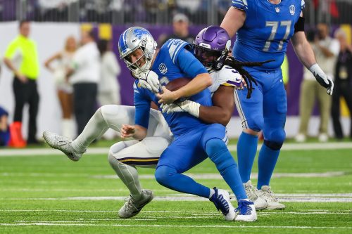 Dec 24, 2023; Minneapolis, Minnesota, USA; Minnesota Vikings linebacker Pat Jones II (91) sacks Detroit Lions quarterback Jared Goff (16) during the second quarter at U.S. Bank Stadium.