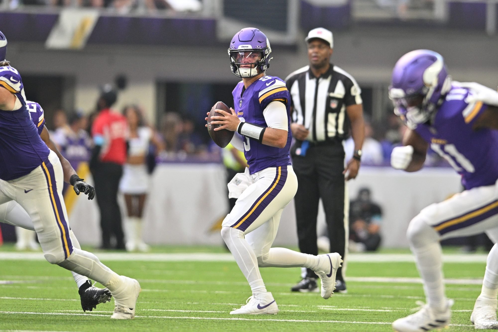 Aug 10, 2024; Minneapolis, Minnesota, USA; Minnesota Vikings quarterback J.J. McCarthy (9) looks to pass during the second quarter against the Las Vegas Raiders at U.S. Bank Stadium.