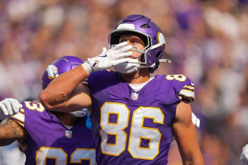 Sep 22, 2024; Minneapolis, Minnesota, USA; Minnesota Vikings tight end Johnny Mundt (86) celebrates his touchdown against the Houston Texans in the fourth quarter at U.S. Bank Stadium.