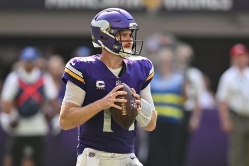 Sep 15, 2024; Minneapolis, Minnesota, USA; Minnesota Vikings quarterback Sam Darnold (14) in action against the San Francisco 49ers during the game at U.S. Bank Stadium.