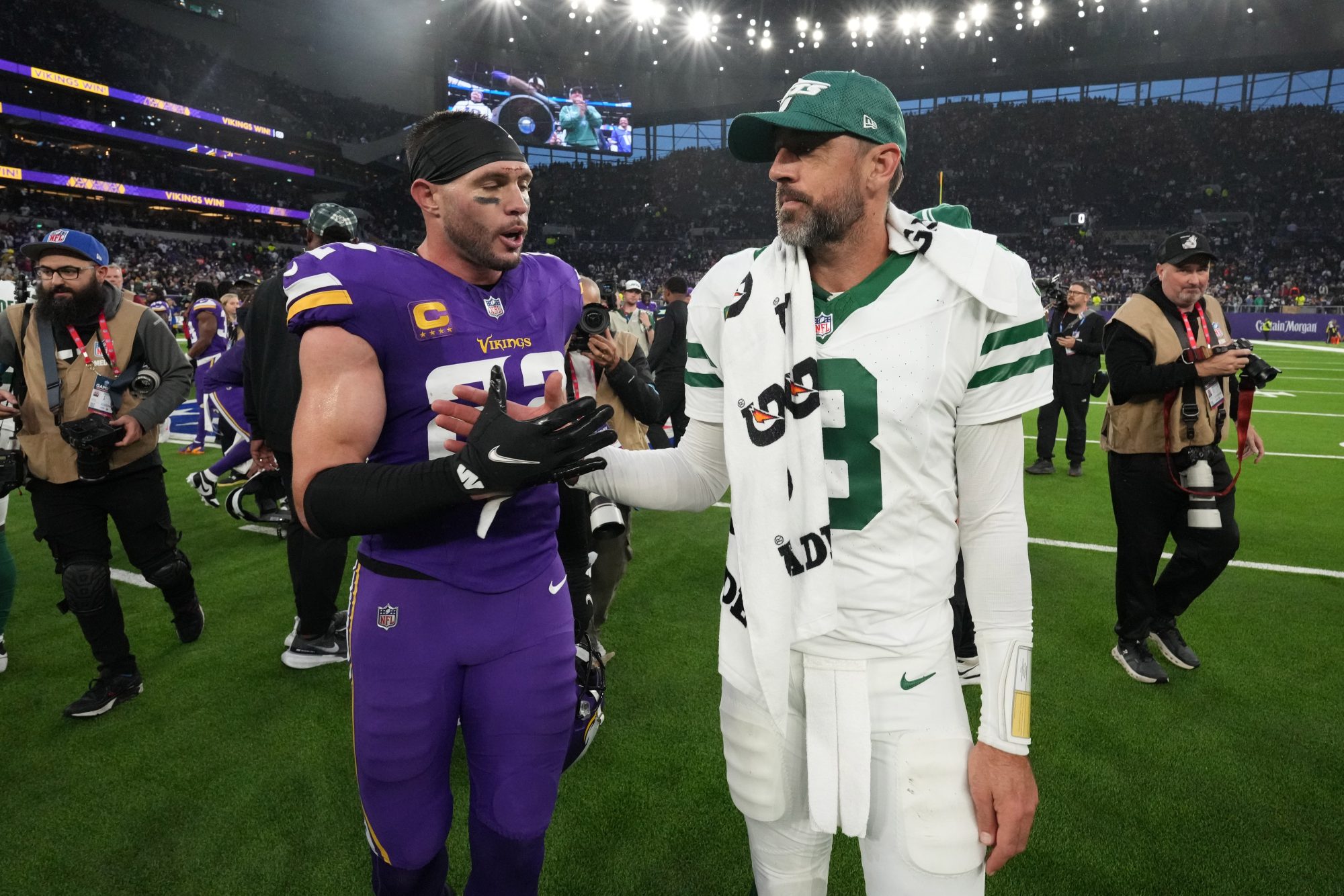 Oct 6, 2024; London, United Kingdom; New York Jets quarterback Aaron Rodgers (8) shakes hands with Minnesota Vikings safety Harrison Smith (22) after the game atTottenham Hotspur Stadium.