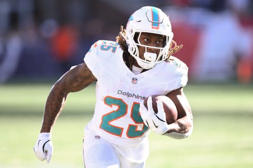 Oct 6, 2024; Foxborough, Massachusetts, USA; Miami Dolphins running back Jaylen Wright (25) runs against the New England Patriots during the second half at Gillette Stadium.