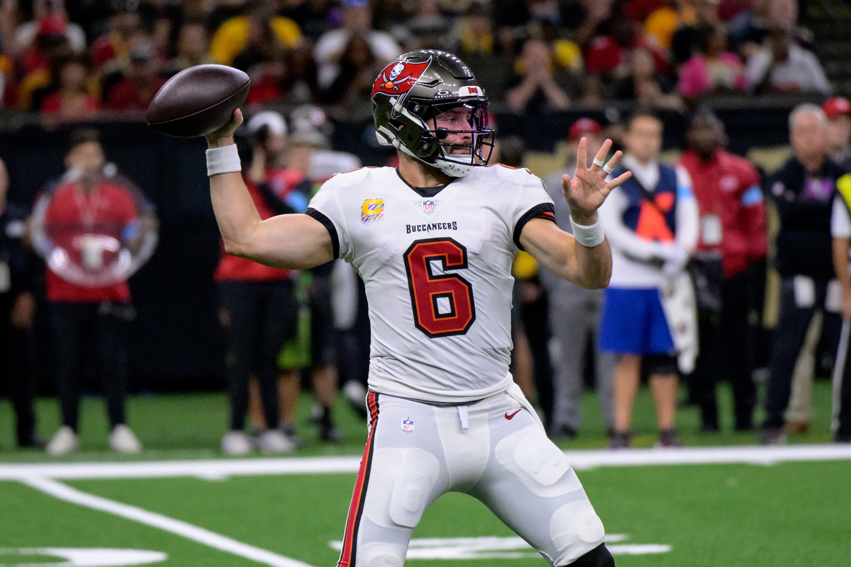 Oct 13, 2024; New Orleans, Louisiana, USA; Tampa Bay Buccaneers quarterback Baker Mayfield (6) throws during the first half of a game against the New Orleans Saints at Caesars Superdome.