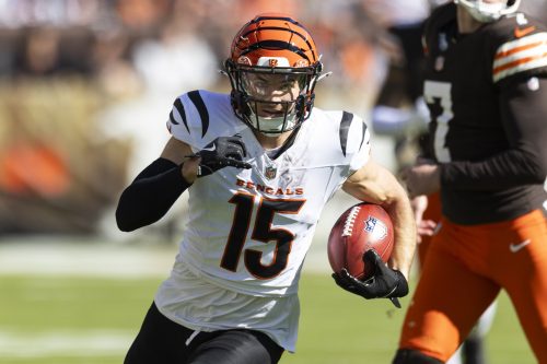 Oct 20, 2024; Cleveland, Ohio, USA; Cincinnati Bengals wide receiver Charlie Jones (15) returns the opening kickoff for a touchdown against the Cleveland Browns during the first quarter at Huntington Bank Field.