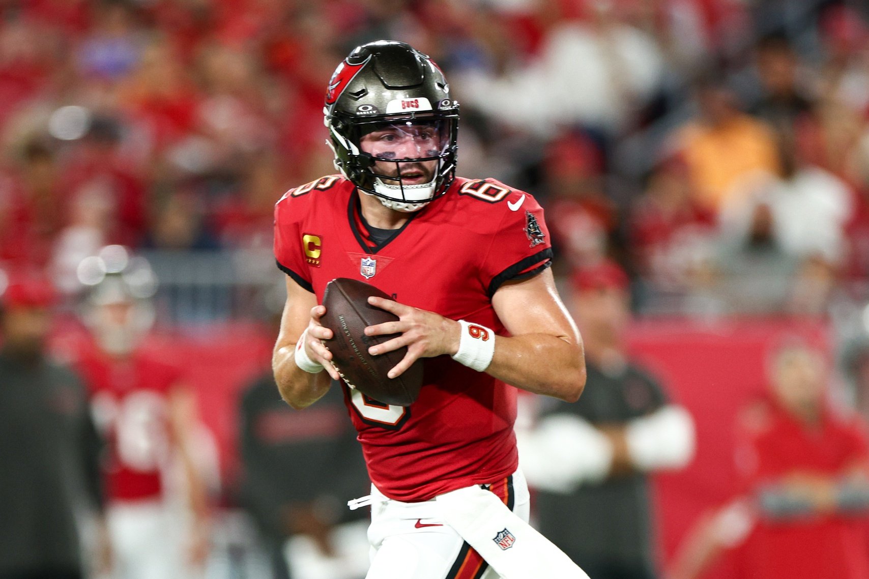 Oct 21, 2024; Tampa, Florida, USA; Tampa Bay Buccaneers quarterback Baker Mayfield (6) drops back to pass against the Baltimore Ravens in the first quarter at Raymond James Stadium.