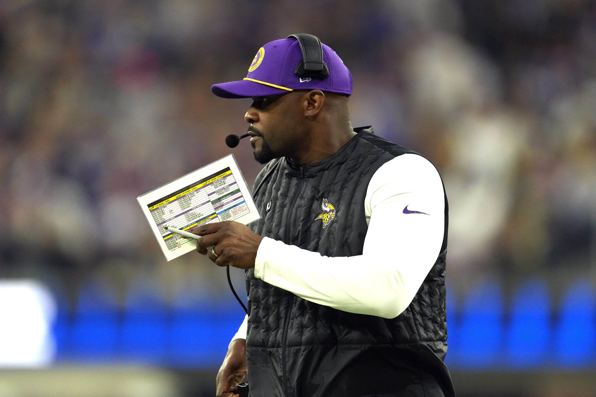 Oct 24, 2024; Inglewood, California, USA; Minnesota Vikings defensive coordinator Brian Flores watches from the sidelines against the Los Angeles Rams in the first half at SoFi Stadium.