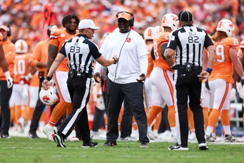 Oct 27, 2024; Tampa, Florida, USA; Tampa Bay Buccaneers head coach Todd Bowles talks to referee Shawn Hochuli (83) after a call against the Atlanta Falcons in the second quarter at Raymond James Stadium.