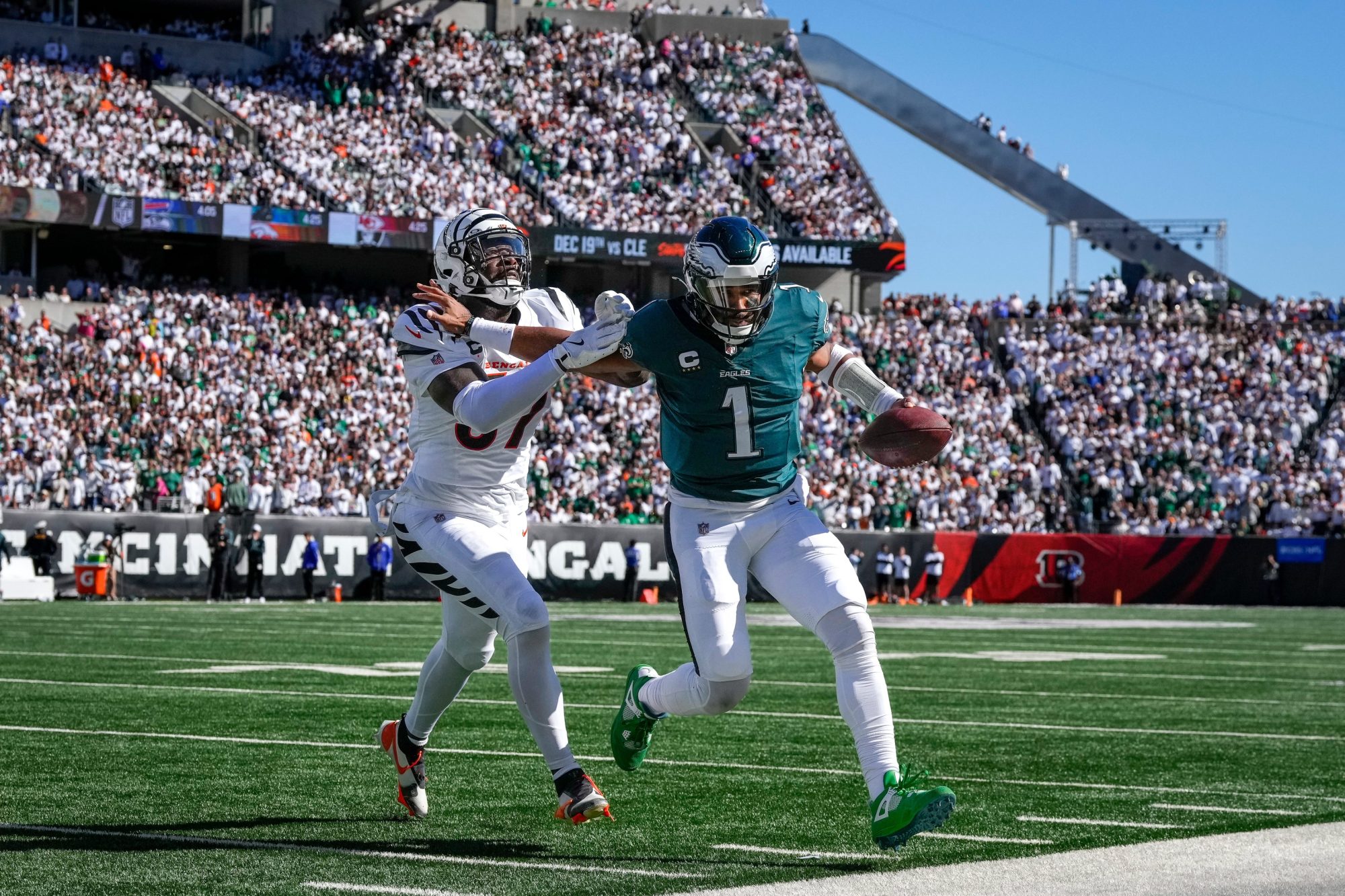 Philadelphia Eagles quarterback Jalen Hurts (1) is forced out of bounds by Cincinnati Bengals linebacker Germaine Pratt (57) in the second quarter of the NFL Week 8 game between the Cincinnati Bengals and the Philadelphia Eagles at Paycor Stadium in downtown Cincinnati on Sunday, Oct. 27, 2024.