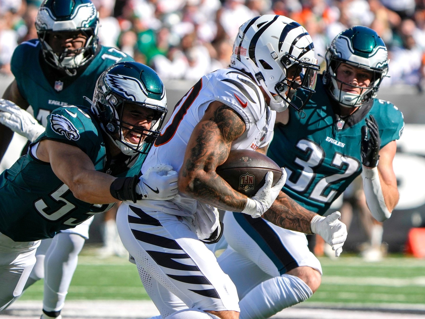 Cincinnati Bengals running back Chase Brown (30) tries to run throw the Philadelphia Eagles defense in the NFL Week 8 matchup at Paycor Stadium during the Sunday October 27, 2024. The Bengals lost 37-17 and remain winless at home.