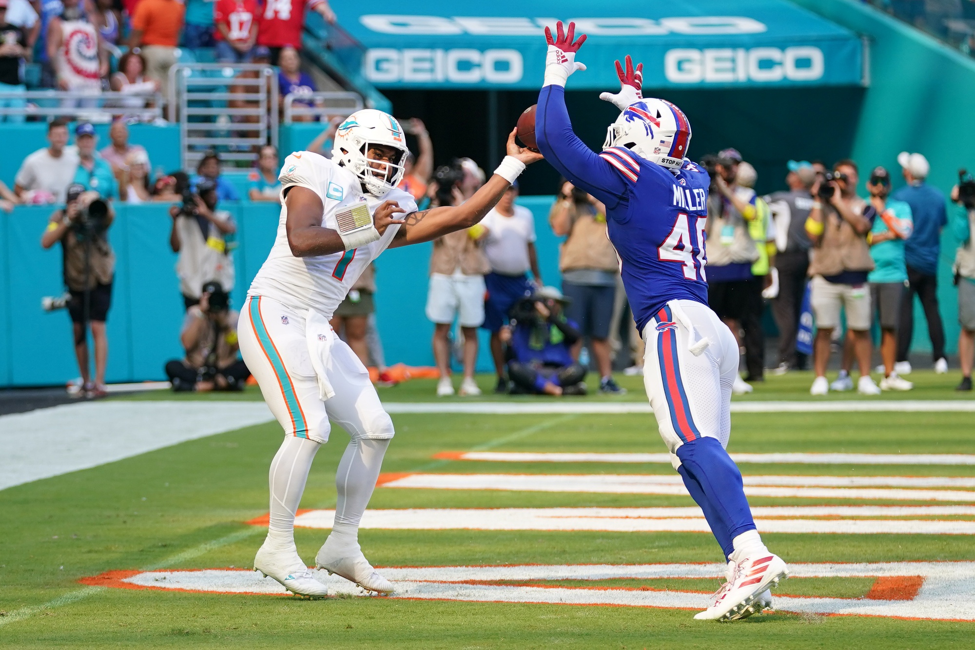 Sep 25, 2022; Miami Gardens, Florida, USA; Buffalo Bills linebacker Von Miller (40) pressures Miami Dolphins quarterback Tua Tagovailoa (1) in the end zone during the second half at Hard Rock Stadium.