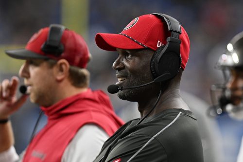 Sep 15, 2024; Detroit, Michigan, USA; Tampa Bay Buccaneers head coach Todd Bowles reacts after the Buccaneers defense stopped the Detroit Lions on a fourth down play late in the fourth quarter at Ford Field.