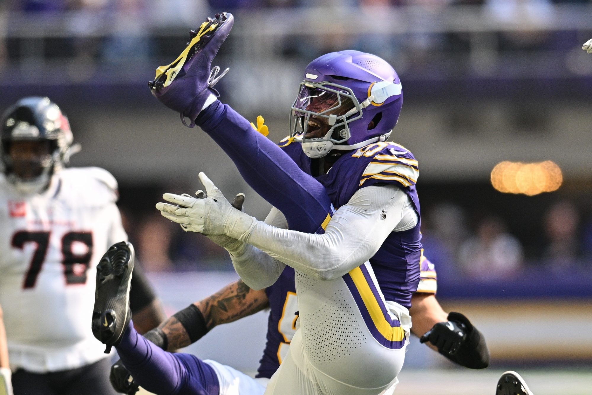 Sep 22, 2024; Minneapolis, Minnesota, USA; Minnesota Vikings linebacker Jonathan Greenard (58) reacts after a sack against the Houston Texans during the fourth quarter at U.S. Bank Stadium.