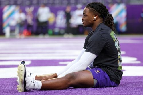 Oct 20, 2024; Minneapolis, Minnesota, USA; Minnesota Vikings linebacker Dallas Turner (15) warms up before the game against the Detroit Lions at U.S. Bank Stadium.