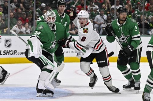 Oct 26, 2024; Dallas, Texas, USA; Dallas Stars goaltender Jake Oettinger (29) and defenseman Matt Dumba (3) and Chicago Blackhawks center Ryan Donato (8) in action during the game between the Dallas Stars and the Chicago Blackhawks at American Airlines Center.