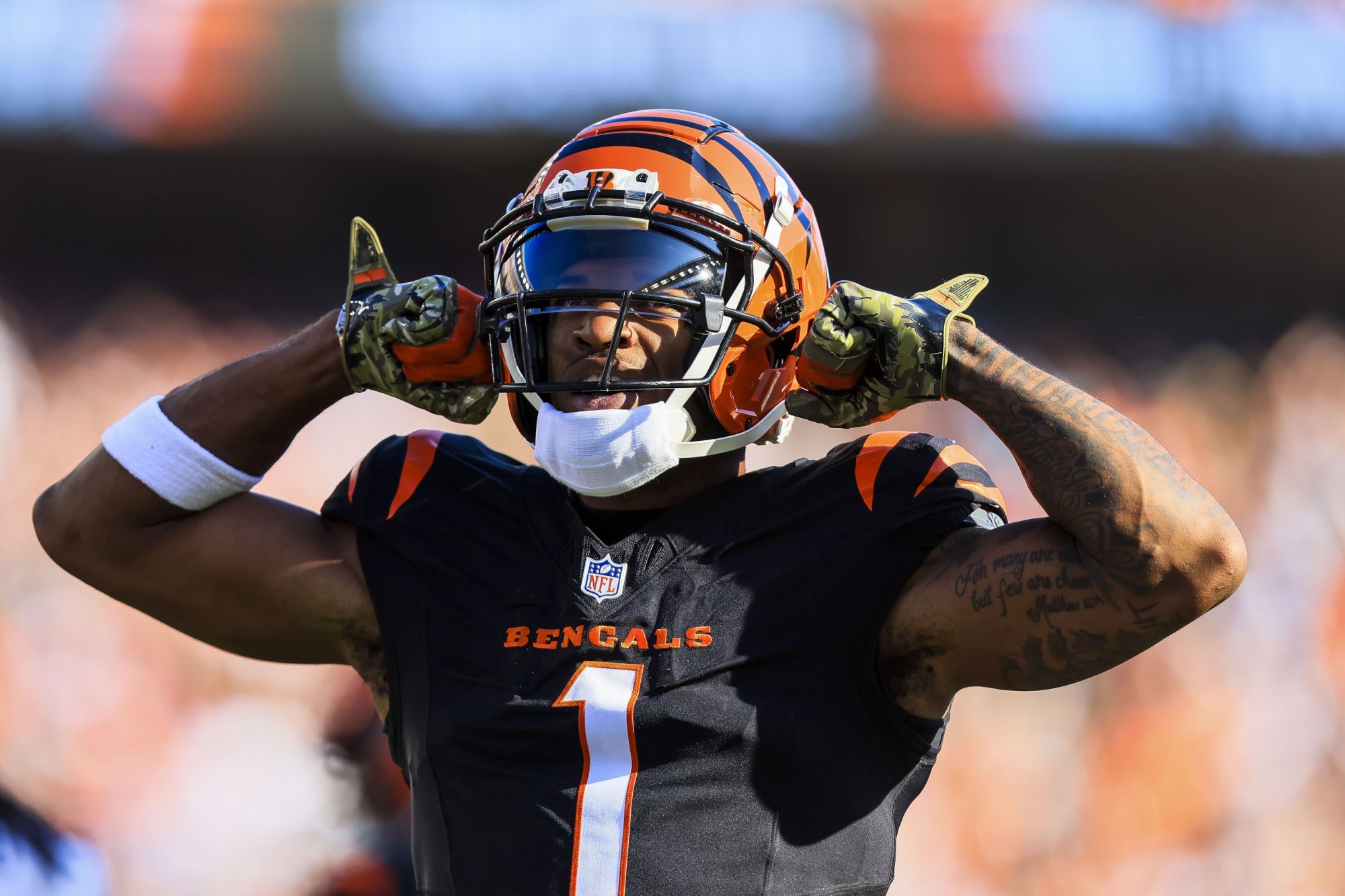 Nov 3, 2024; Cincinnati, Ohio, USA; Cincinnati Bengals wide receiver Ja'Marr Chase (1) reacts after a play against the Las Vegas Raiders in the first half at Paycor Stadium.