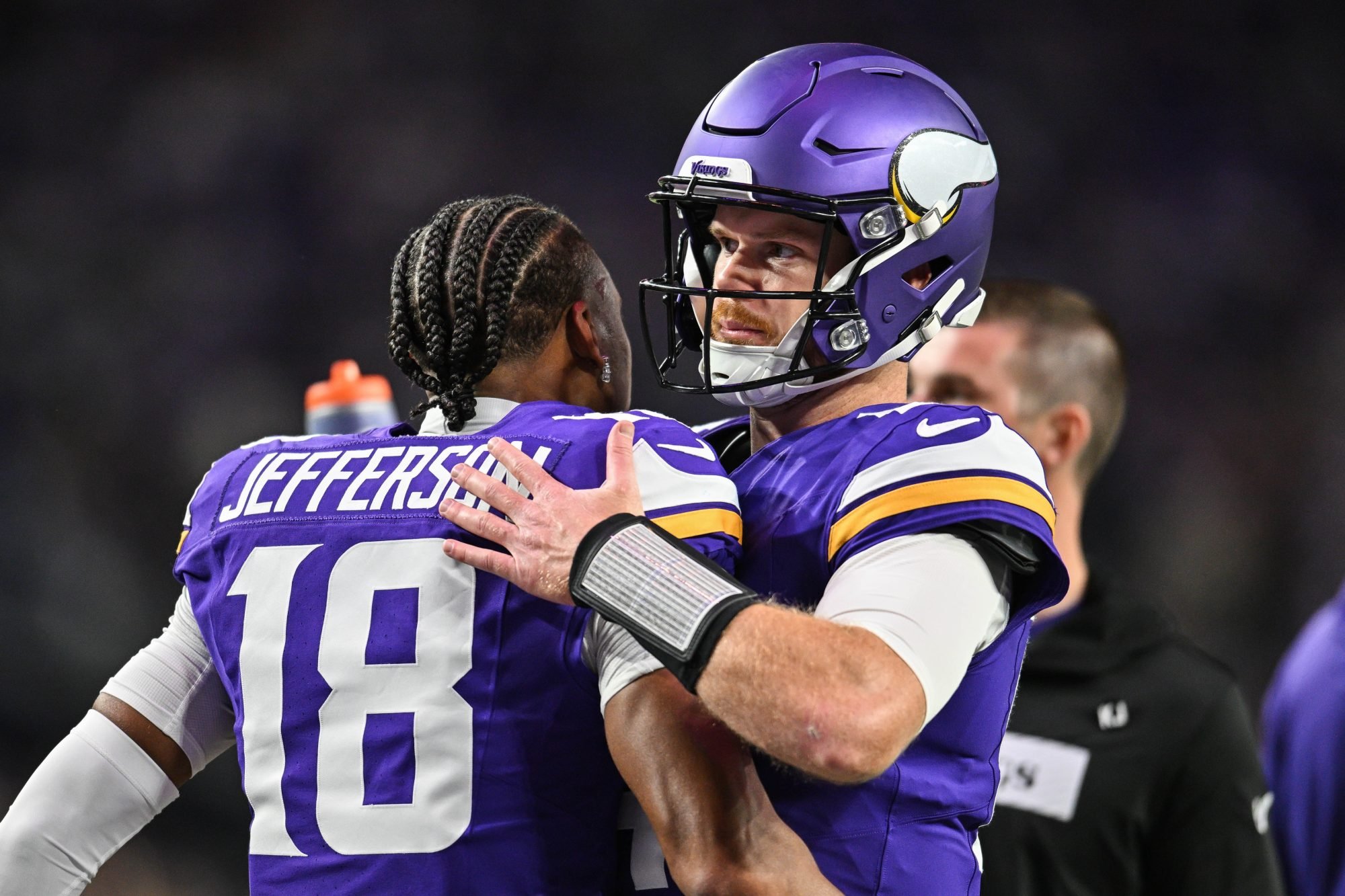 Nov 3, 2024; Minneapolis, Minnesota, USA; Minnesota Vikings quarterback Sam Darnold (14) and wide receiver Justin Jefferson (18) warm up before the game against the Indianapolis Colts at U.S. Bank Stadium.