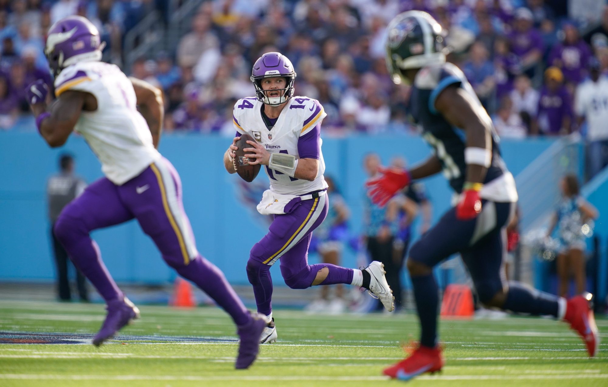 Minnesota Vikings quarterback Sam Darnold (14) looks downfield during the third quarter against the Tennessee Titans at Nissan Stadium in Nashville, Tenn., Sunday, Nov. 17, 2024.