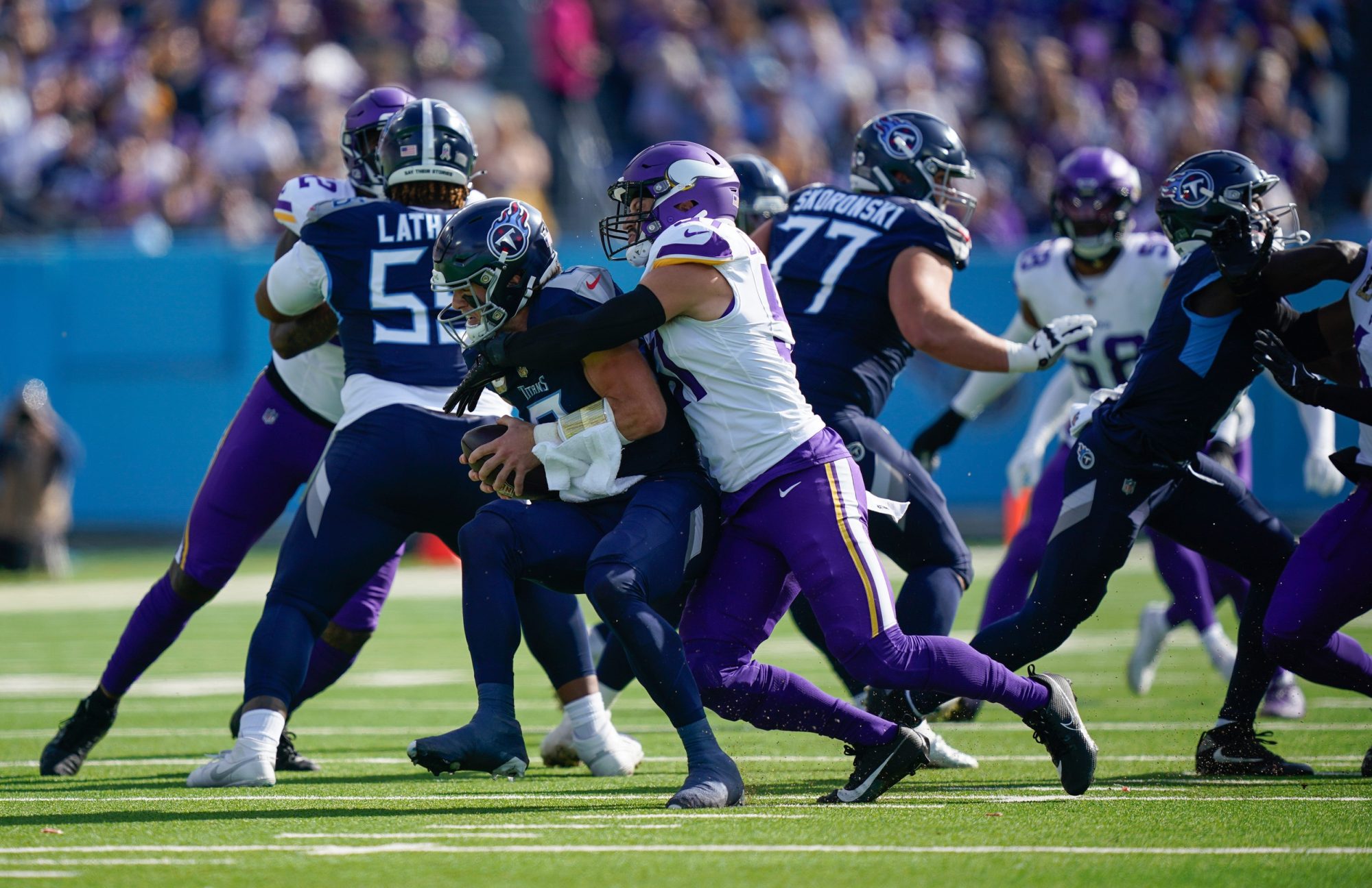 Minnesota Vikings linebacker Blake Cashman (51) sacks Tennessee Titans quarterback Will Levis (8) during the first quarter at Nissan Stadium in Nashville, Tenn., Sunday, Nov. 17, 2024.