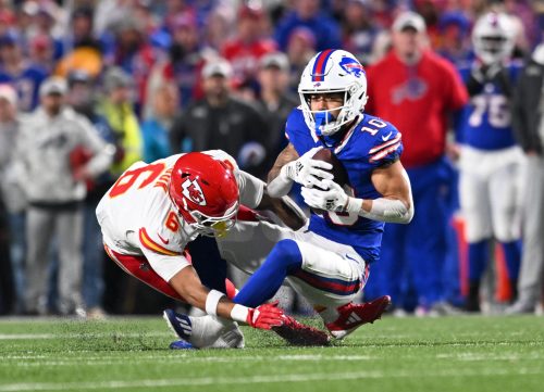 Nov 17, 2024; Orchard Park, New York, USA; Buffalo Bills wide receiver Khalil Shakir (10) is tackled by Kansas City Chiefs safety Bryan Cook (6) after making a catch in the fourth quarter at Highmark Stadium.