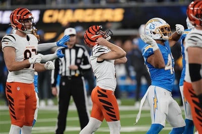 Evan McPherson reacts after missing a second field goal against the Chargers.