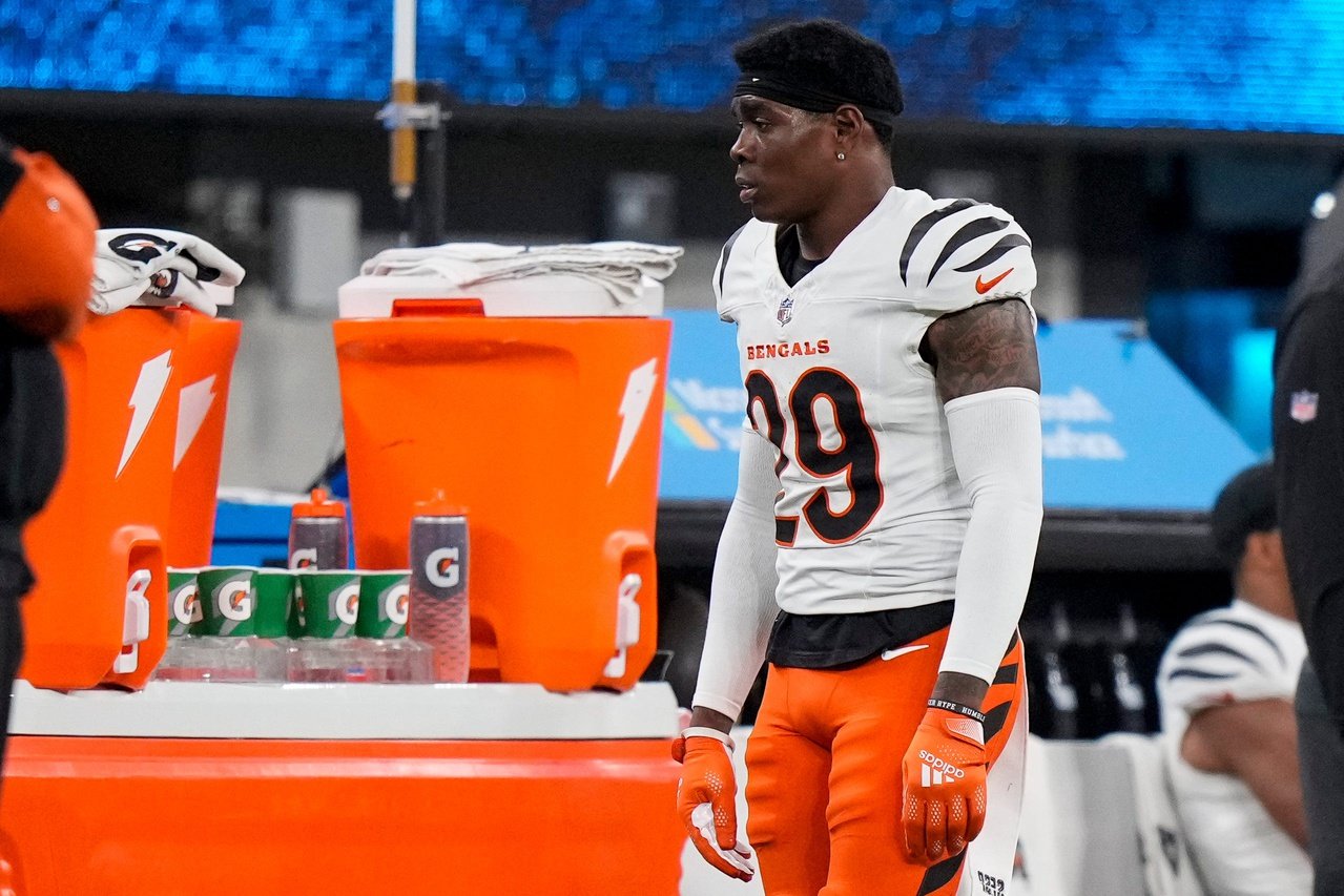 Cincinnati Bengals cornerback Cam Taylor-Britt (29) returns to the bench after Los Angeles Chargers running back J.K. Dobbins (27) runs for the go-ahead touchdown in the fourth quarter of the NFL Week 11 game between the Los Angeles Chargers and the Cincinnati Bengals at SoFi Stadium in Inglewood, Calif., on Sunday, Nov. 17, 2024. The Chargers won 34-27.