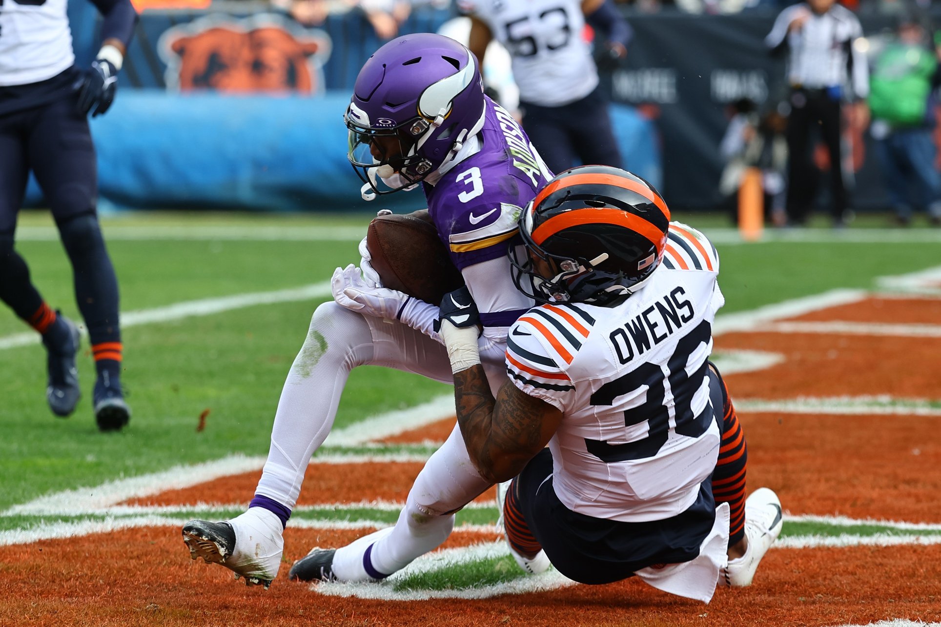 Nov 24, 2024; Chicago, Illinois, USA; Minnesota Vikings wide receiver Jordan Addison (3) catches a touchdown pass against Chicago Bears safety Jonathan Owens (36) during the second quarter at Soldier Field.