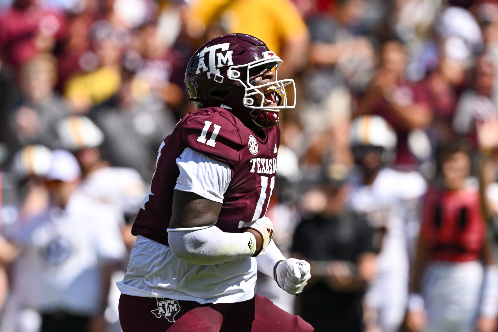 Oct 5, 2024; College Station, Texas, USA; Texas A&M Aggies defensive lineman Nic Scourton (11) reacts after sacking Missouri Tigers quarterback Brady Cook (not pictured) in the first quarter at Kyle Field.