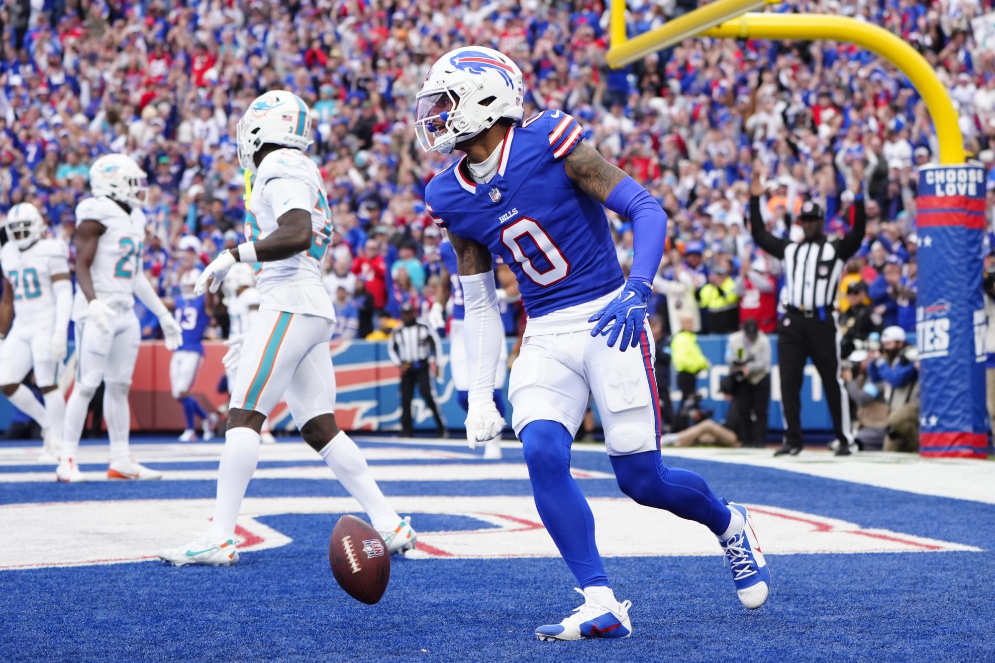 Nov 3, 2024; Orchard Park, New York, USA; Buffalo Bills wide receiver Keon Coleman (0) celebrates catching a two point conversion against the Miami Dolphins during the second half at Highmark Stadium.