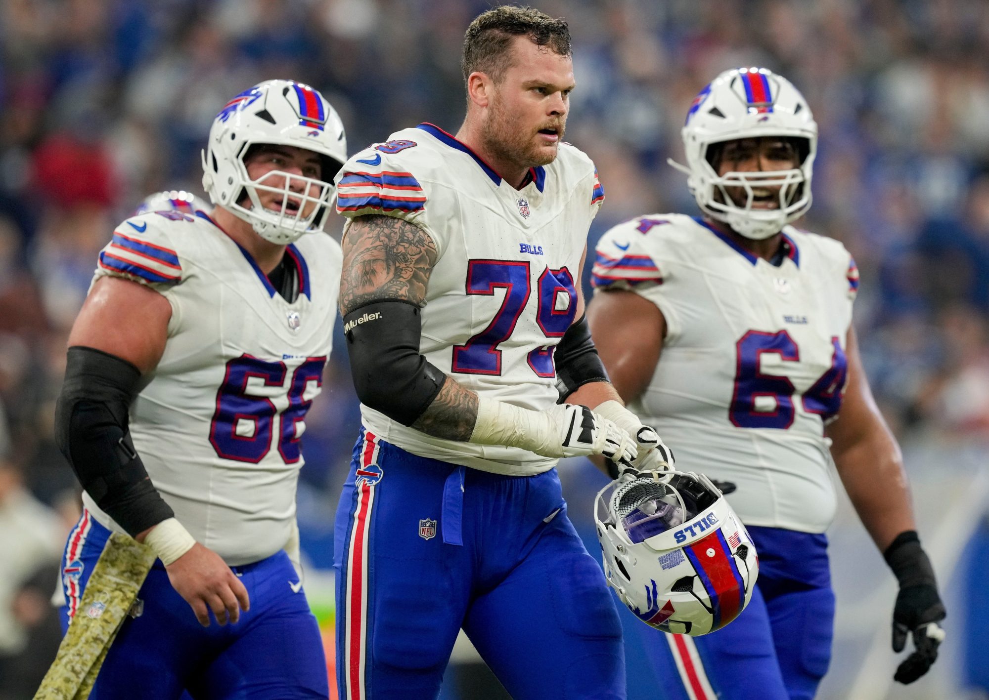 Buffalo Bills offensive tackle Spencer Brown (79) walks off the field with teammates Sunday, Nov. 10, 2024, during a game against the Indianapolis Colts at Lucas Oil Stadium in Indianapolis.