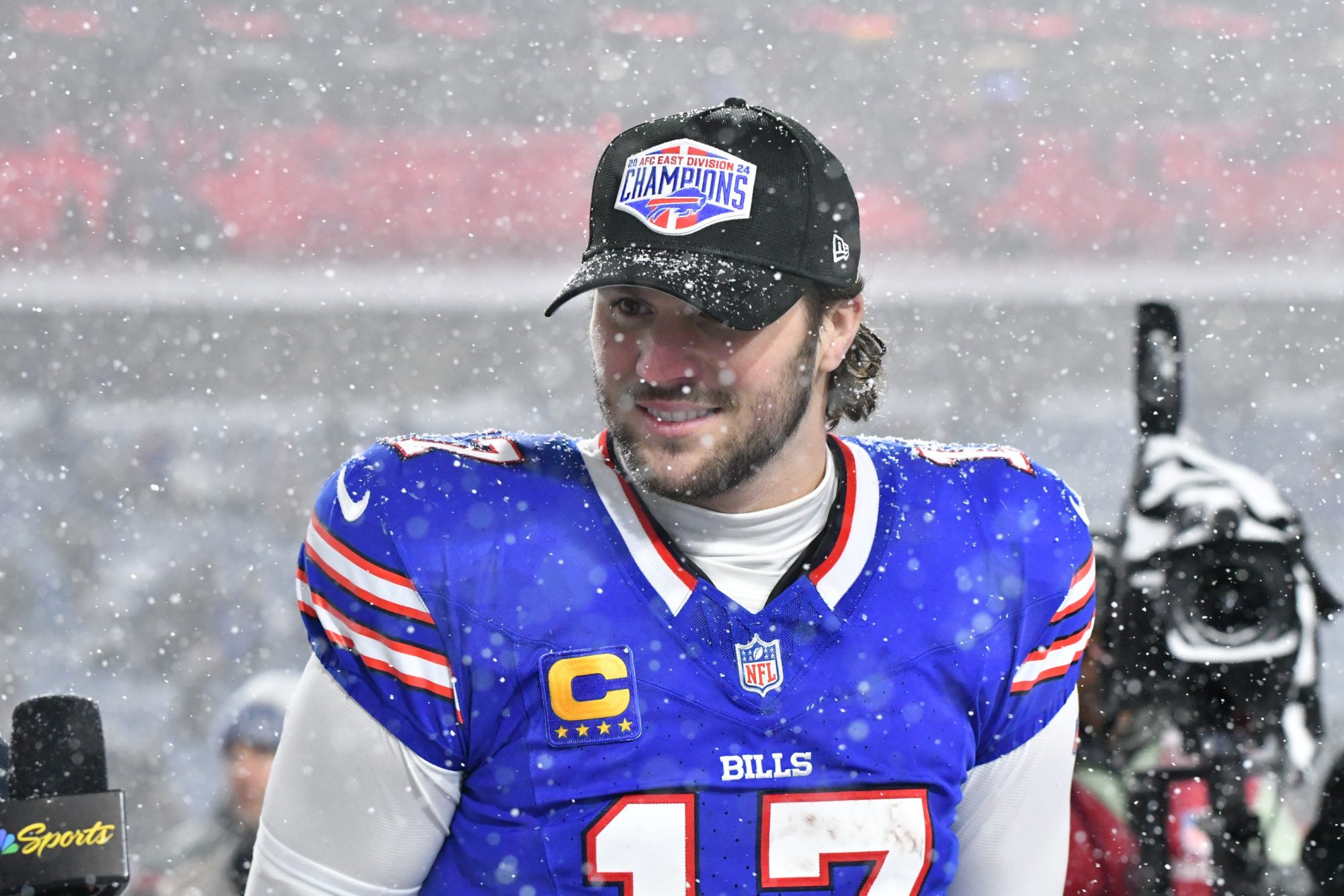 Dec 1, 2024; Orchard Park, New York, USA; Buffalo Bills quarterback Josh Allen (17) is interviewed after winning a game against the San Francisco 49ers to clinch the AFC East title at Highmark Stadium.