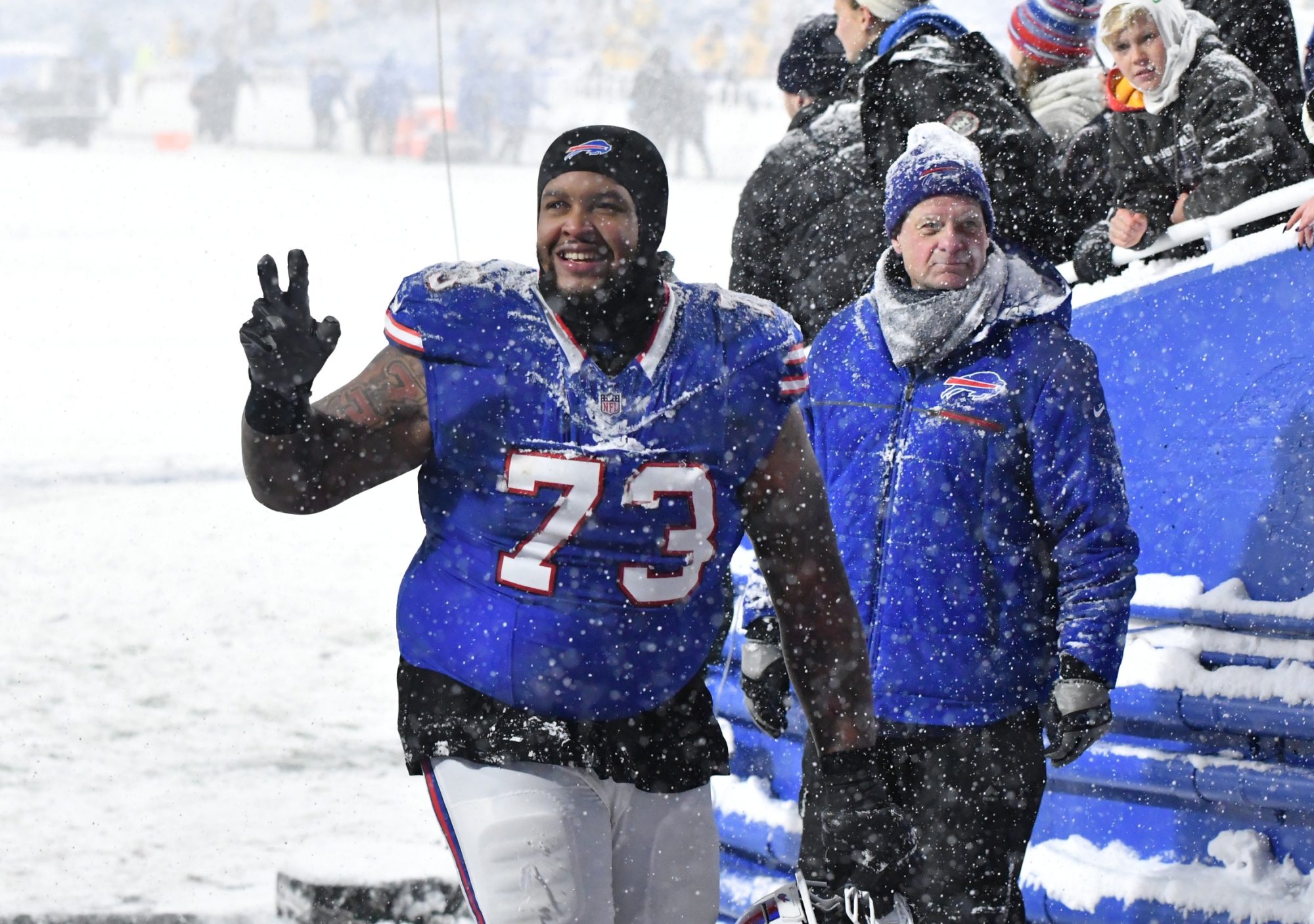 Dec 1, 2024; Orchard Park, New York, USA; Buffalo Bills offensive tackle Dion Dawkins (73) leaves the field after winning a game against the San Francisco 49ers to clinch the AFC East title at Highmark Stadium.