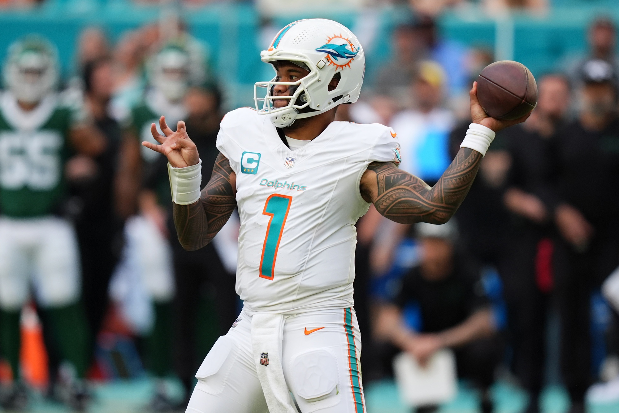 Dec 8, 2024; Miami Gardens, Florida, USA; Miami Dolphins quarterback Tua Tagovailoa (1) attempts a pass against the New York Jets during the second half at Hard Rock Stadium.