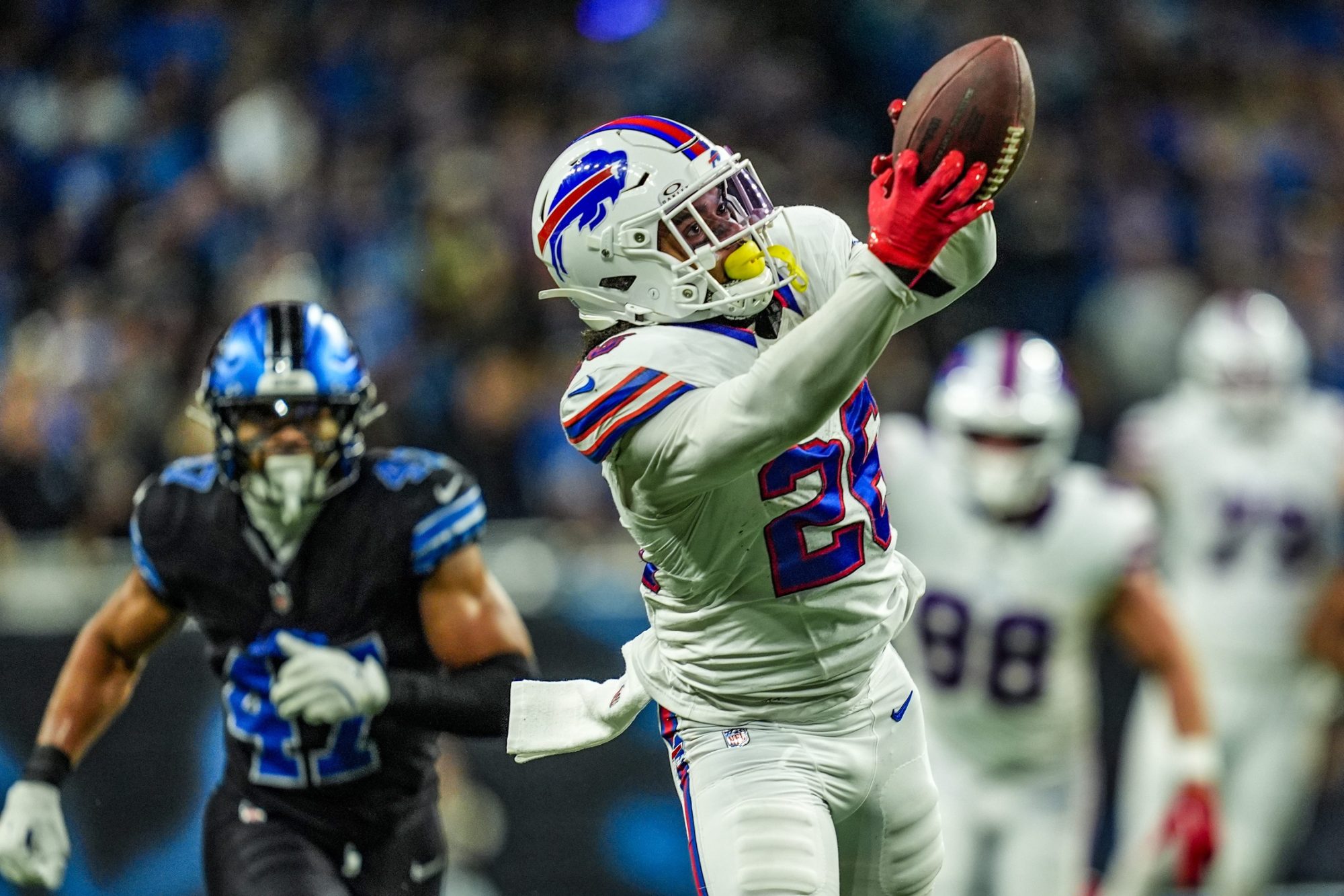 Buffalo Bills running back Ty Johnson (26) catches a pass during the first half at Ford Field in Detroit on Sunday, Dec. 15, 2024.