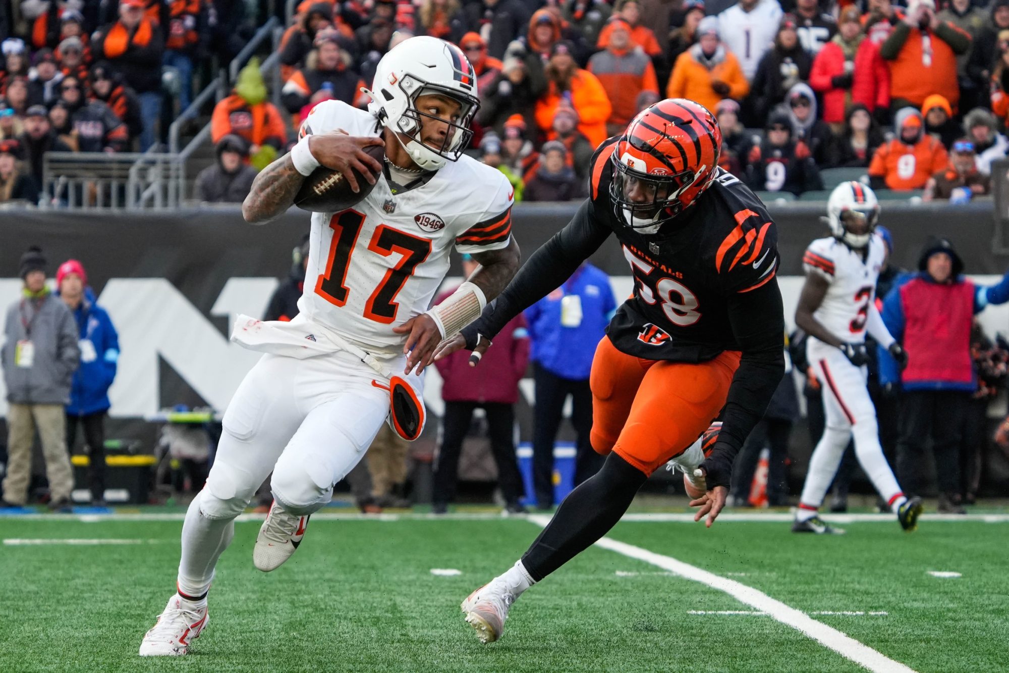 Bengals Joseph Ossai (58) chases down Browns Dorian Thompson-Robinson (17) during their game against the Browns at Paycor Stadium on Sunday December 22, 2024. The Bengals won the game with a final score of 24-6.