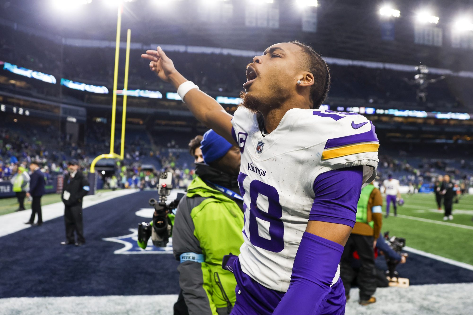 Dec 22, 2024; Seattle, Washington, USA; Minnesota Vikings wide receiver Justin Jefferson (18) celebrates following a victory against the Seattle Seahawks at Lumen Field.