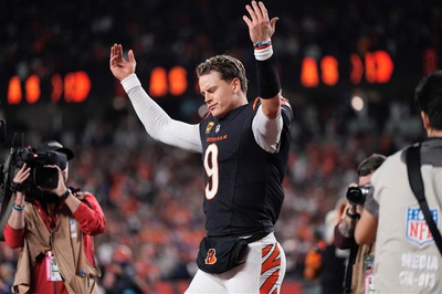 Cincinnati Bengals' quarterback Joe Burrow celebrates after his team's overtime win Dec. 28 at Paycor Stadium. The Bengals defeated the Broncos, 30-24, when Burrow found receiver Tee Higgins in the end zone to end the contest.