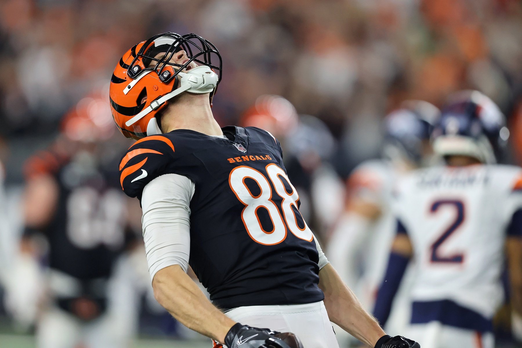 Dec 28, 2024; Cincinnati, Ohio, USA; Cincinnati Bengals tight end Mike Gesicki (88) reacts after catching a first down pass in overtime against the Denver Broncos at Paycor Stadium.