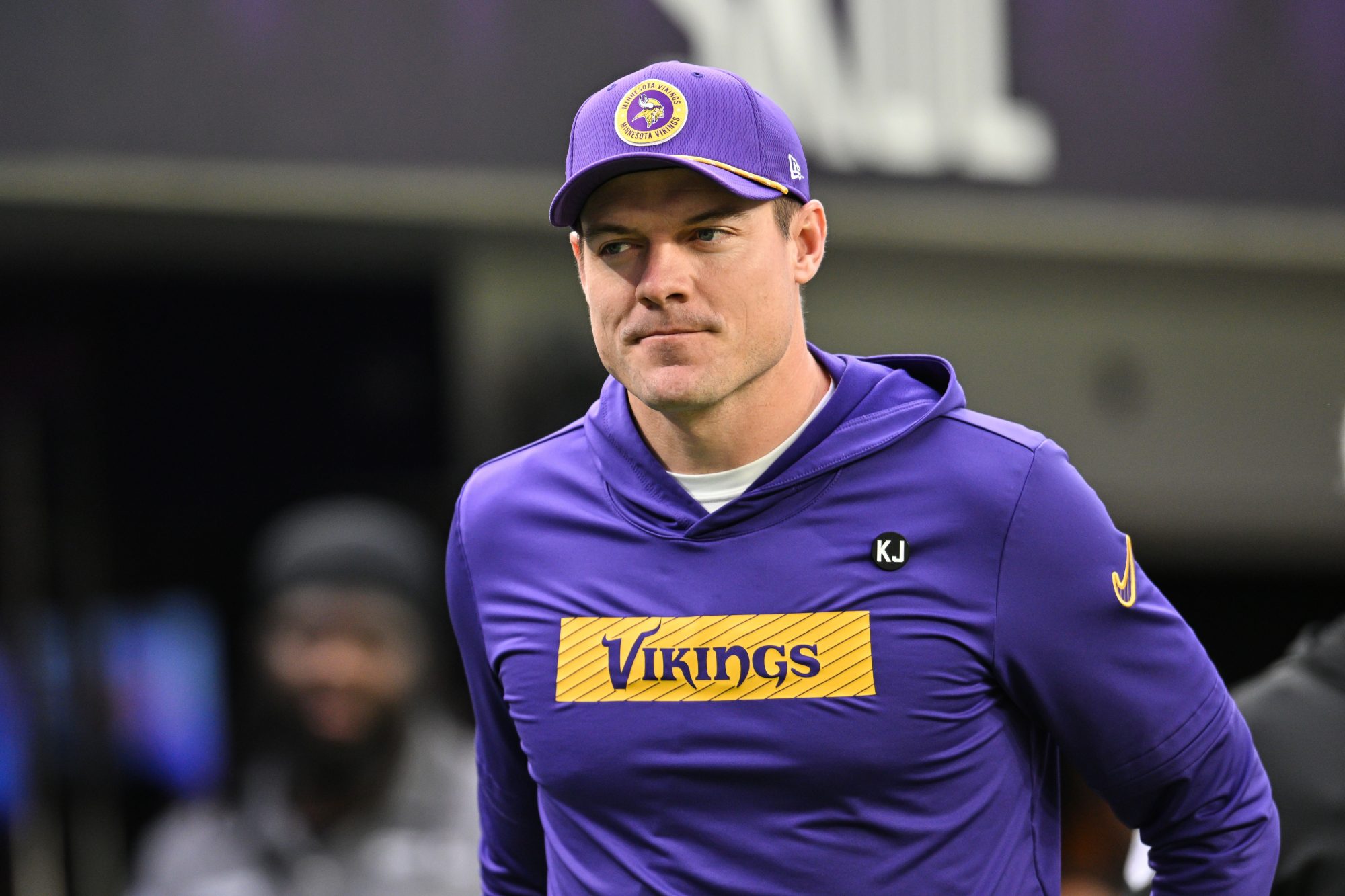 Dec 29, 2024; Minneapolis, Minnesota, USA; Minnesota Vikings head coach Kevin O'Connell walks onto the field before the game against the Green Bay Packers at U.S. Bank Stadium.