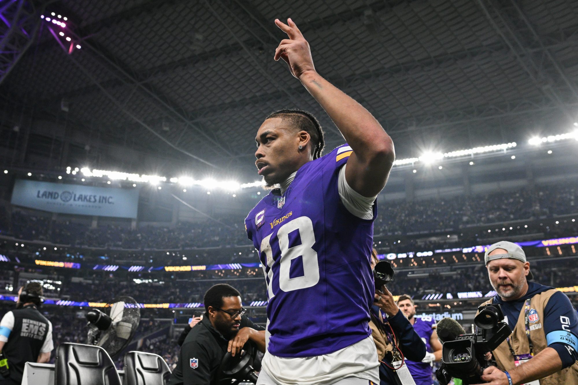 Dec 29, 2024; Minneapolis, Minnesota, USA; Minnesota Vikings wide receiver Justin Jefferson (18) walks off the field after the game against the Green Bay Packers at U.S. Bank Stadium.