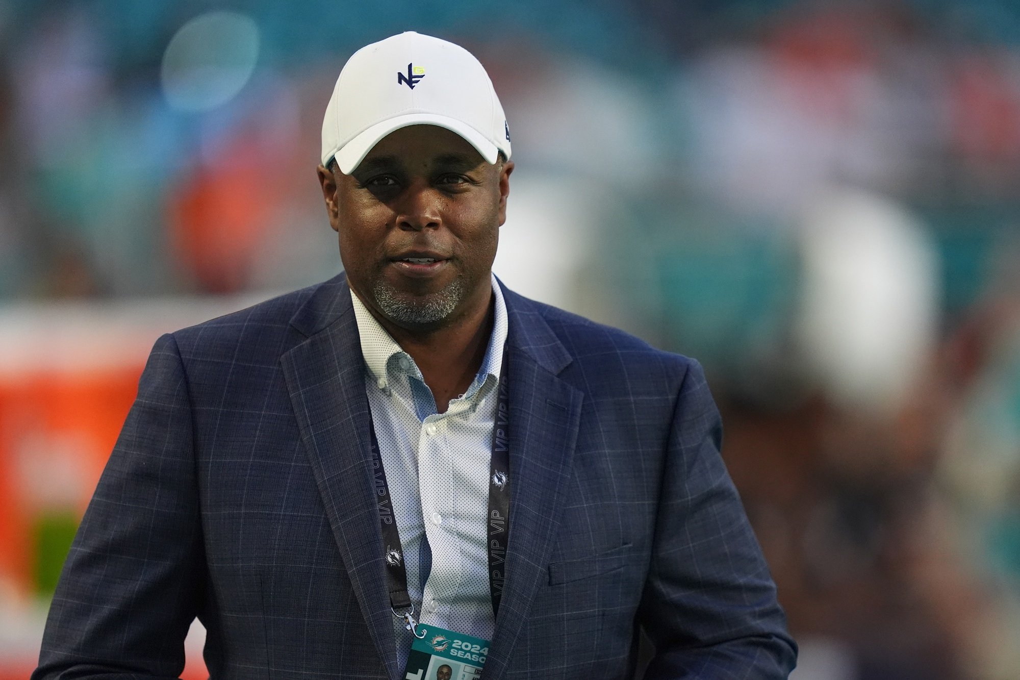 Sep 30, 2024; Miami Gardens, Florida, USA; Miami Dolphins general manager Chris Grier walks not the field prior to the game between the Miami Dolphins and the Tennessee Titans at Hard Rock Stadium.