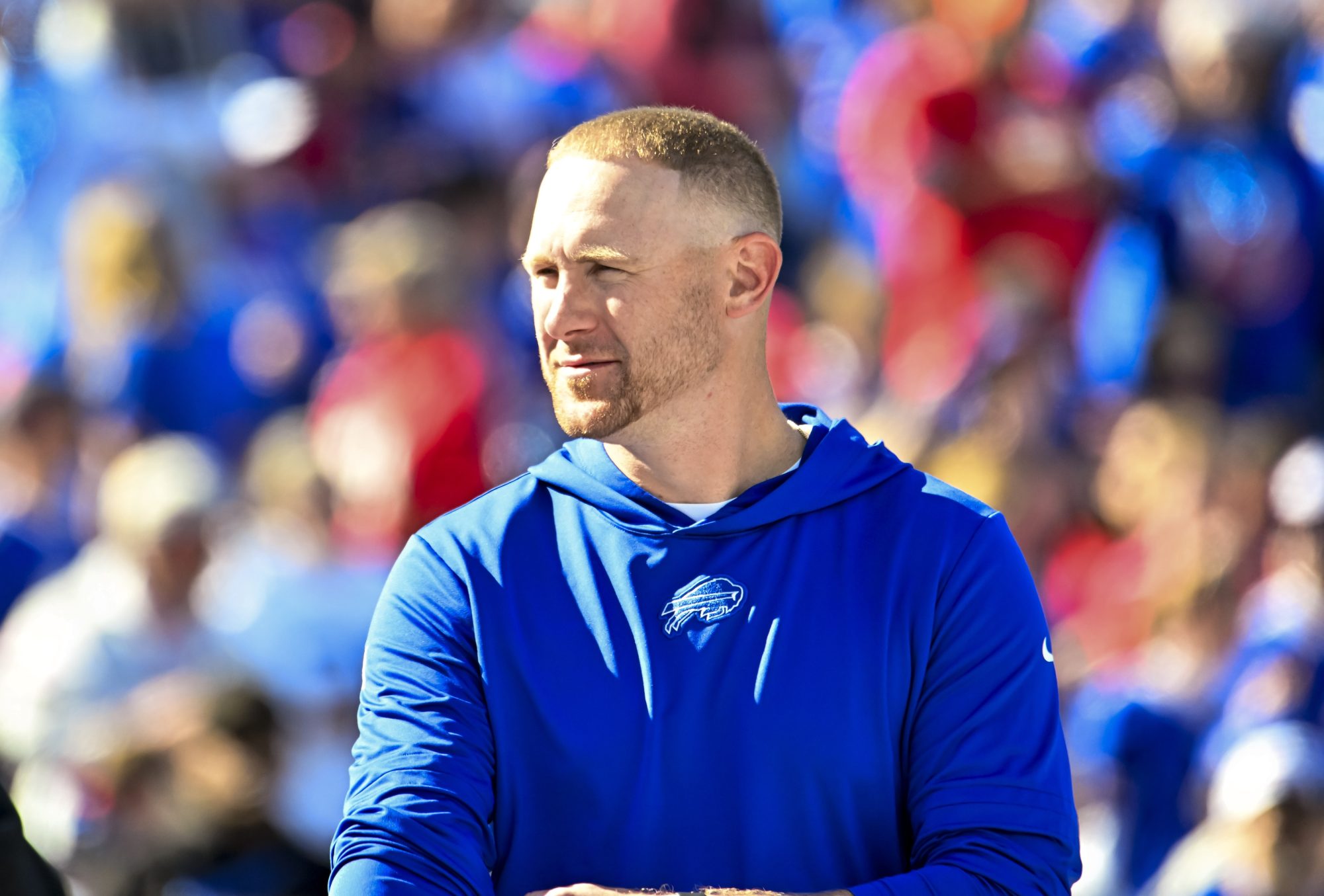 Oct 20, 2024; Orchard Park, New York, USA; Buffalo Bills offensive coordinator Joe Brady on th field before a game against the Tennessee Titans at Highmark Stadium.