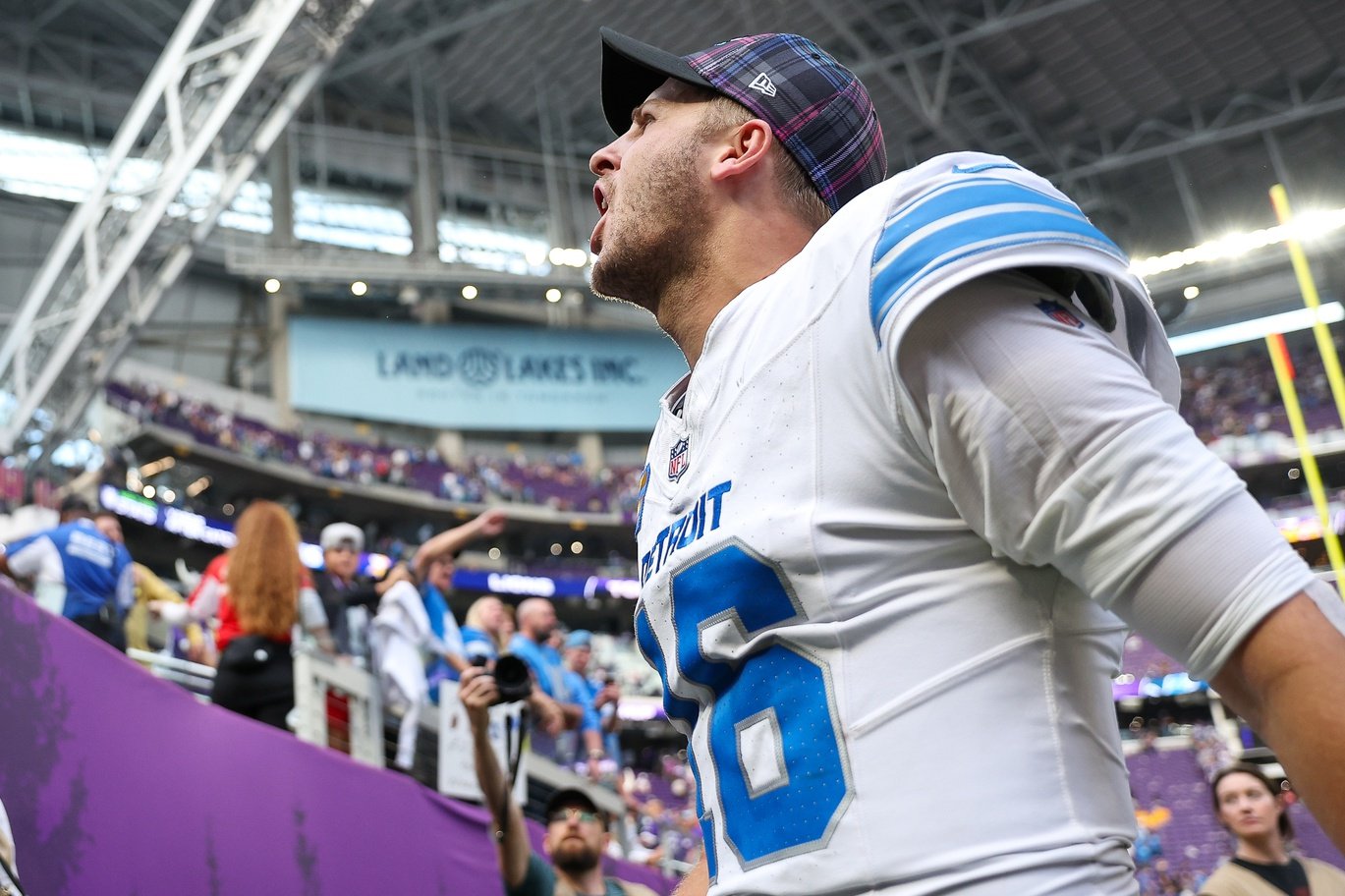 Oct 20, 2024; Minneapolis, Minnesota, USA; Detroit Lions quarterback Jared Goff (16) celebrates his teams win after the game against the Minnesota Vikings at U.S. Bank Stadium.