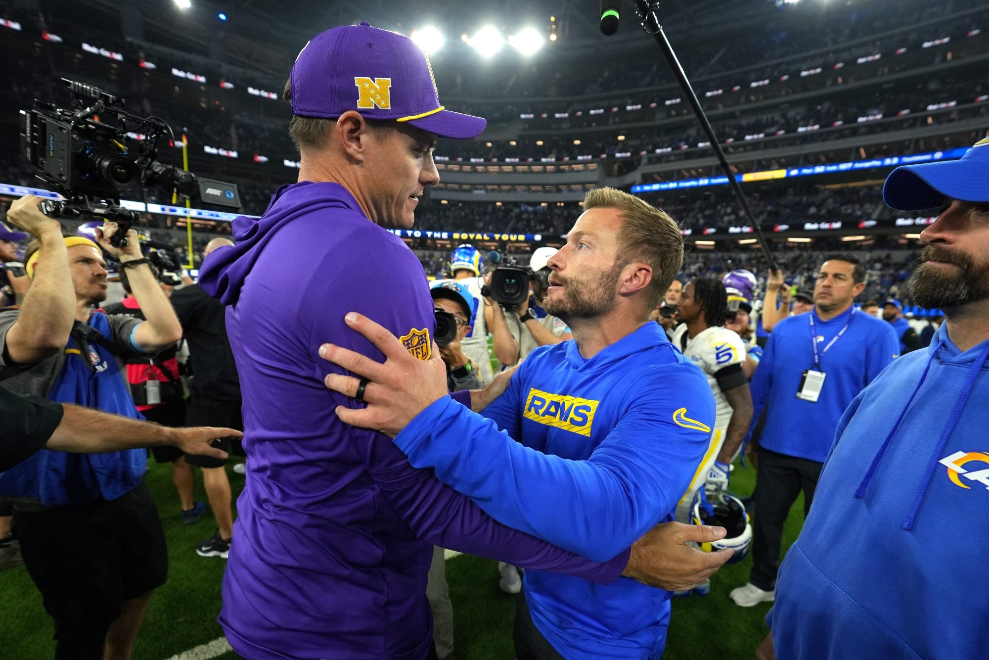 Oct 24, 2024; Inglewood, California, USA; Minnesota Vikings coach Kevin O'Connell (left) and Los Angeles Rams coach Sean McVay shake hands after the game at SoFi Stadium.